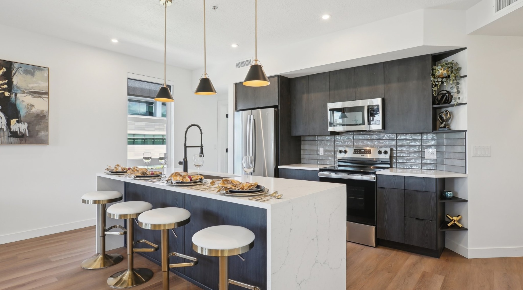 Liberty Duet Apartments, Salt Lake City, Utah, Kitchen with dark cabinets, island, stainless steel appliances