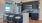 Liberty Duet Apartments, Salt Lake City, Utah, Kitchen with dark cabinets, island, stainless steel appliances, 4 barstools at island