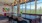 Liberty Duet Apartments, Salt Lake City, Utah, Rooftop Lounge, Shuffleboard table, kitchen, table.