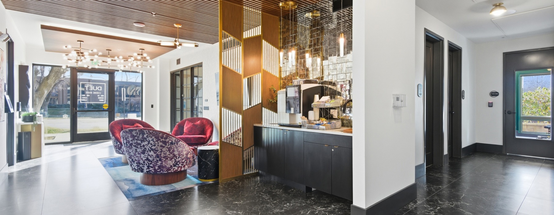 Liberty Duet Apartments, Salt Lake City Utah, lobby area with seating and coffee machine