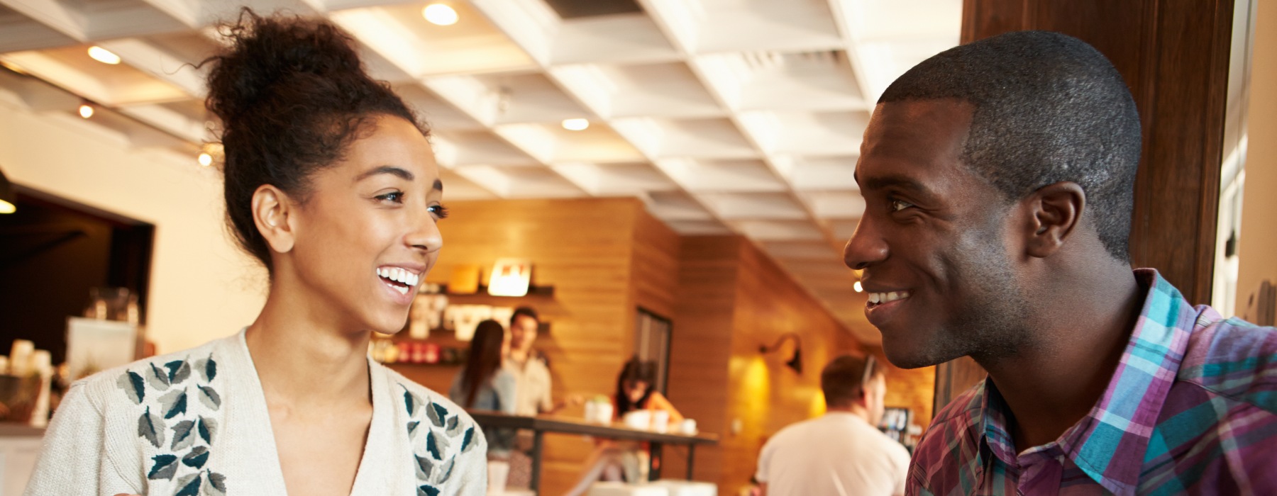 multiracial couple looking at each other